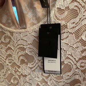 Bcbg size small cream colored lace overlay top new with tags